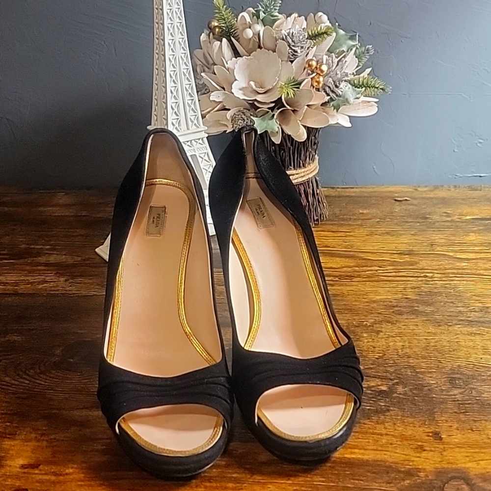 Prada open toes high heels.